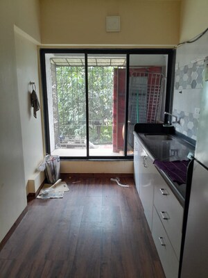Kitchen in 1 BHK Apartment at Philjoy CHS, Borivali West – for Sale