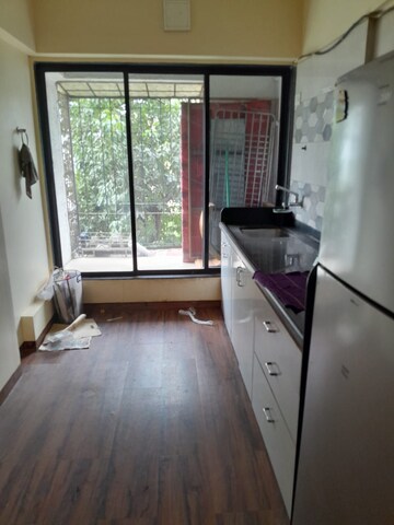 Kitchen in 1 BHK Apartment at Philjoy CHS, Borivali West – for Sale
