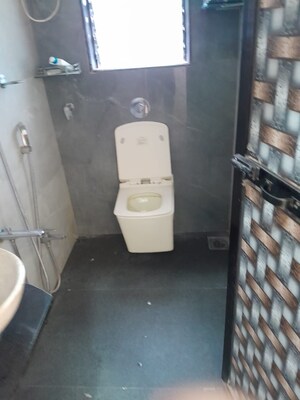 Master Bedroom in 1 BHK Apartment at Philjoy CHS, Borivali West – for Sale