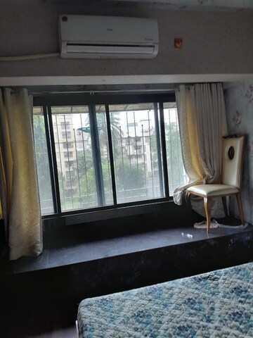 Living Room in 1 BHK Apartment at Philjoy CHS, Borivali West – for Sale