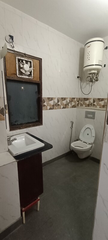 Bathroom in 3.5 BHK Builder Floor at Kalkaji – for Rent