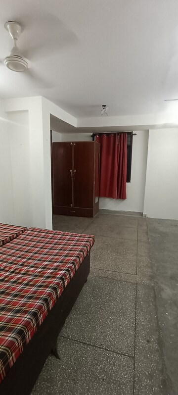 Bedroom in 3.5 BHK Builder Floor at Kalkaji – for Rent