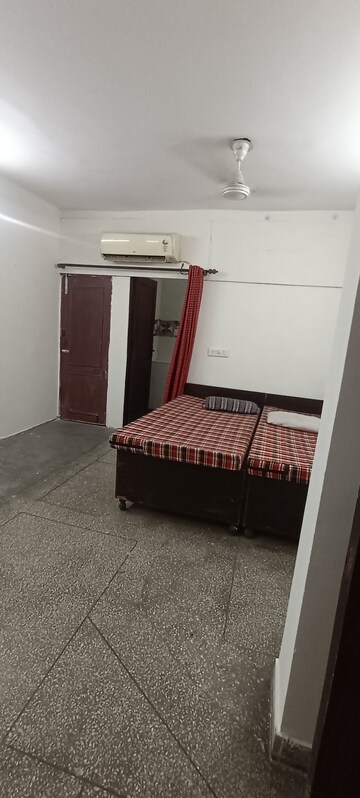 Bedroom in 3.5 BHK Builder Floor at Kalkaji – for Rent