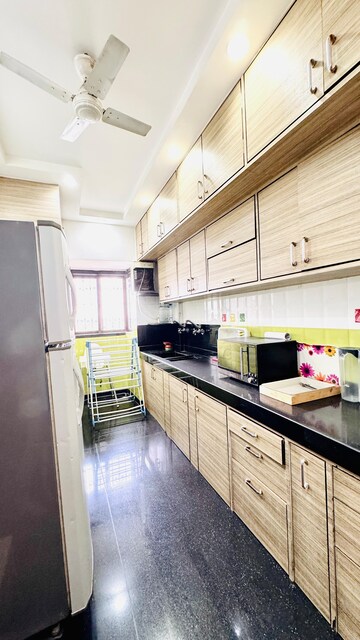 Kitchen in 3 BHK Apartment at RNA NG Eclat, Andheri West – for Rent