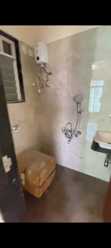 Bathroom in 1 BHK Apartment at Hirani Om Sukhkarta Heights, Vikhroli East – for Rent