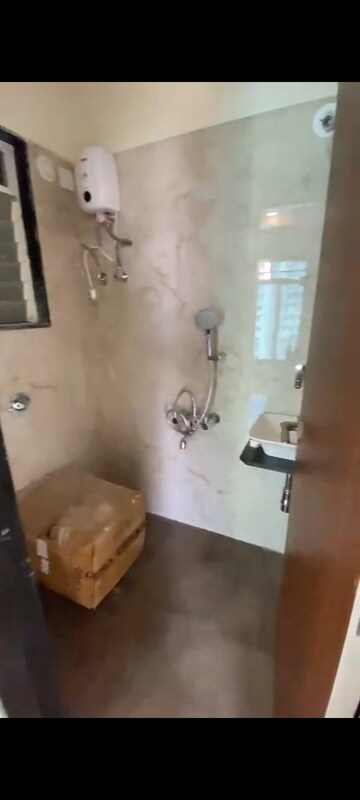 Bathroom in 1 BHK Apartment at Hirani Om Sukhkarta Heights, Vikhroli East – for Rent
