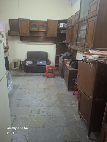 Living Room in 1 BHK Apartment at Ooranwala Mansion, Dadar East – for Sale