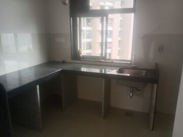 Kitchen in 2 BHK Apartment at Runwal Eirene, Balkum Pada – for Rent