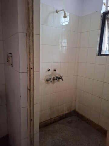 Bathroom in 1 RK Apartment at RWA Apartments Sector 45, Sector 45 – for Sale