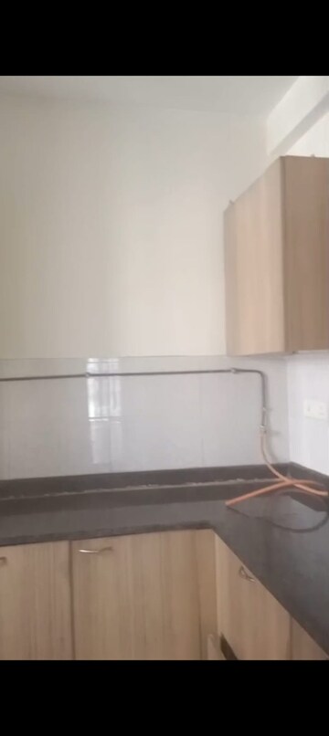 Kitchen in 2 BHK Apartment at Panchsheel Greens, Sector 16 Greater Noida – for Rent