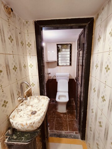 Bathroom in 1 BHK Apartment at Deep Heights, Nalasopara West – for Rent