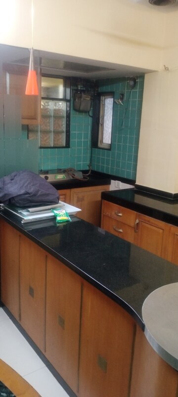 Kitchen in 1.5 BHK Apartment at Ashirwad Co Operative Society, Andheri East – for Rent