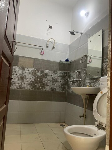 Bathroom in 2 BHK Apartment at Dhakoli – for Sale