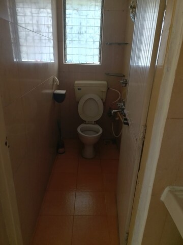 Bathroom in 2 BHK Apartment at Narendra Apartment CHS, Santacruz West – for Rent
