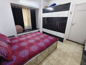 Bedroom in 2 BHK Apartment at Park Avenue Apartment Kandivali, Kandivali West – for Sale