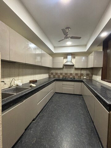Kitchen in 3 BHK Builder Floor at Sarvodaya Enclave – for Rent