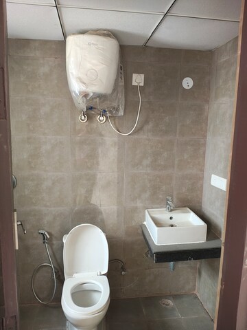 Bathroom in 2.5 BHK Apartment at Breez Flora Avenue 33, Sohna Sector 33 – for Rent