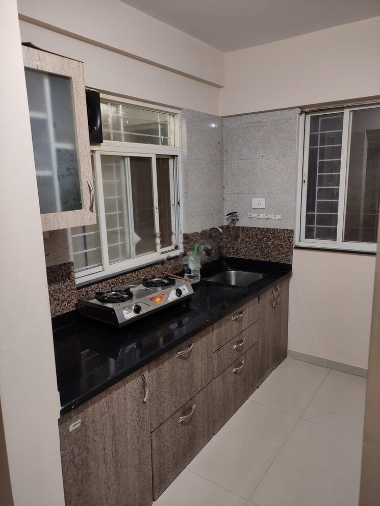 Kitchen, ag-west-one 2 Bedroom 805 Sq.Ft. Apartment In Wakad Pune 8934597