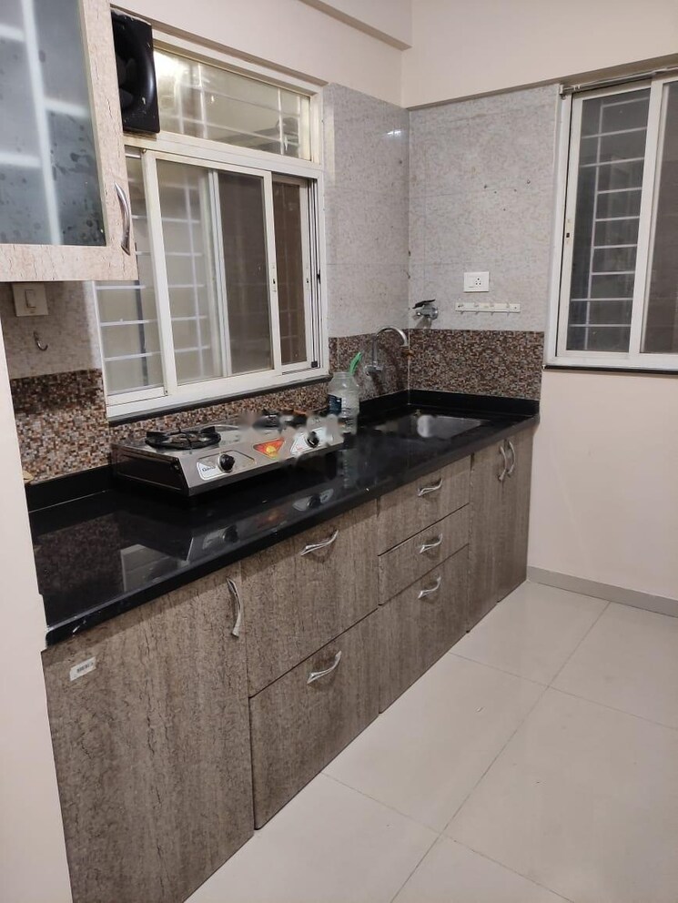 Kitchen, ag-west-one 2 Bedroom 805 Sq.Ft. Apartment In Wakad Pune 8934597
