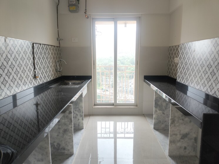 Kitchen, shree-tirupati-stg-signature-residency 2 Bedroom 730 Sq.Ft. Apartment In Patlipada Thane 8934660