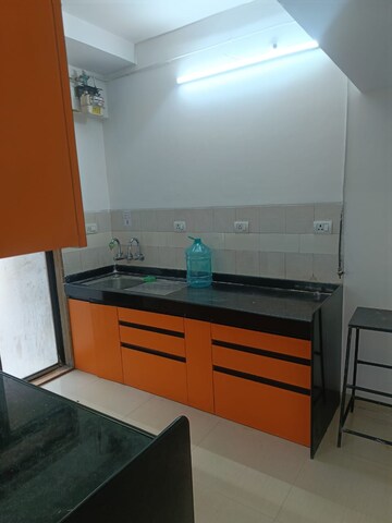 Kitchen in 2 BHK Apartment at Lodha Paradise, Majiwada – for Rent