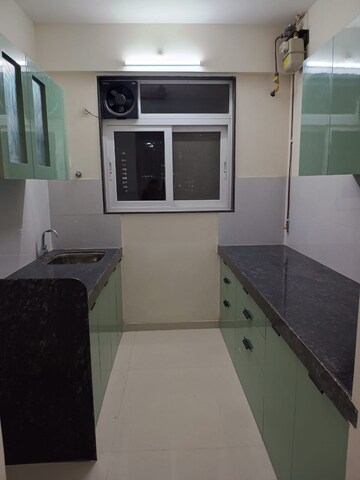 Kitchen in 1 BHK Apartment at Ashar Axis, Majiwada – for Rent