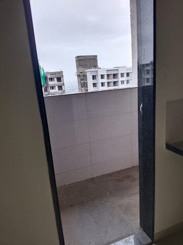 Building Lobby in 1 BHK Apartment at Kolte Patil R10, Hinjewadi – for Rent