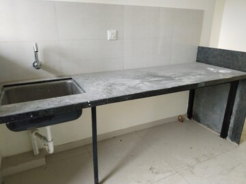 Kitchen in 1 BHK Apartment at Kolte Patil R10, Hinjewadi – for Rent