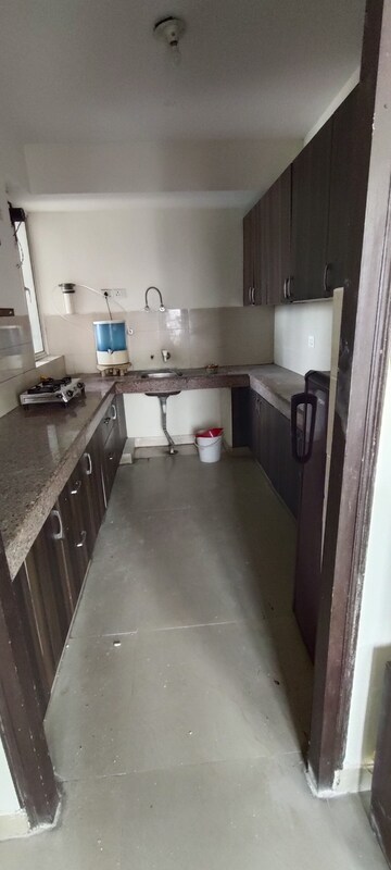 Kitchen in 2.5 BHK Apartment at Logix Blossom Greens, Sector 143 – for Rent