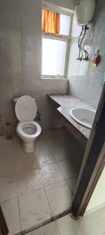 Bathroom in 2.5 BHK Apartment at Logix Blossom Greens, Sector 143 – for Rent