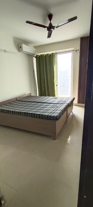 Bedroom in 2.5 BHK Apartment at Logix Blossom Greens, Sector 143 – for Rent