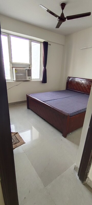 Bedroom in 2.5 BHK Apartment at Logix Blossom Greens, Sector 143 – for Rent