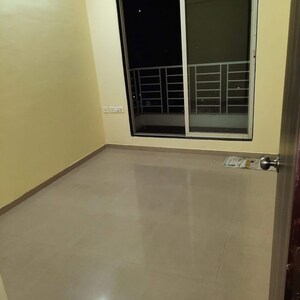 Room in 2 BHK Apartment at Aniruddha Residency, Kamothe Sector 20 – for Sale