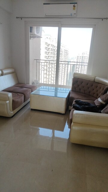 Living Room in 2 BHK Apartment at Antriksh Golf View, Sector 78 – for Rent