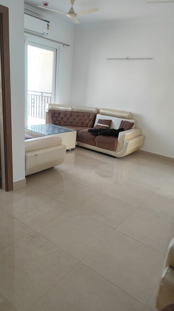 Living Room in 2 BHK Apartment at Antriksh Golf View, Sector 78 – for Rent