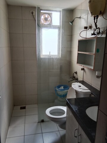 Bathroom in 2 BHK Apartment at Antriksh Golf View, Sector 78 – for Rent