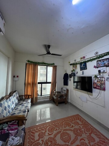 Living Room in 1 BHK Apartment at Lodha Crown Quality Homes Dombivli, Dombivli East – for Rent