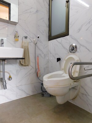 Bathroom in 1 BHK Apartment at Alamdar Marine Palace, Marine Lines – for Sale