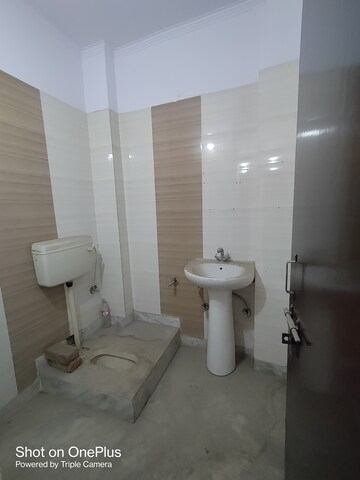 Bathroom in 1.5 BHK Builder Floor at Dwarka Mor – for Rent
