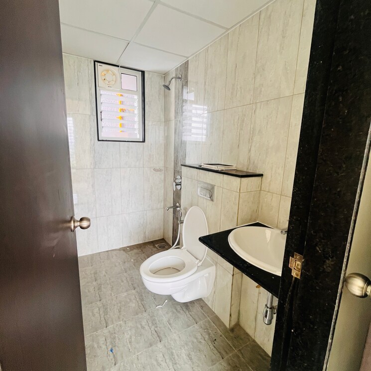 Bathroom, kolte-patil-life-republic 2 Bedroom 700 Sq.Ft. Apartment In Marunji Pune 8935195