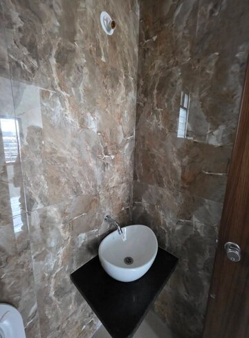 Bathroom in 2 BHK Apartment at Devtaa Codename Desire, Nahur West – for Rent