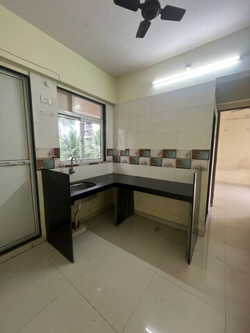 Kitchen in 1 BHK Apartment at Parsik Nagar – for Sale