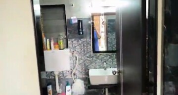Living Room in 1 BHK Apartment at Agarwal Paramount, Virar West – for Sale
