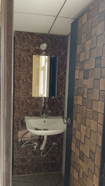 Bathroom in 2 BHK Apartment at Andromida Planet One, Bhopura – for Rent