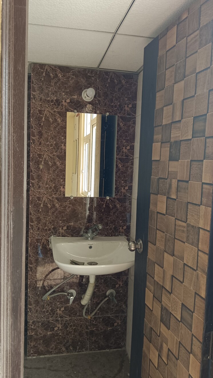 Bathroom, andromida-planet-one 2 Bedroom 960 Sq.Ft. Apartment In Bhopura Ghaziabad 8935309