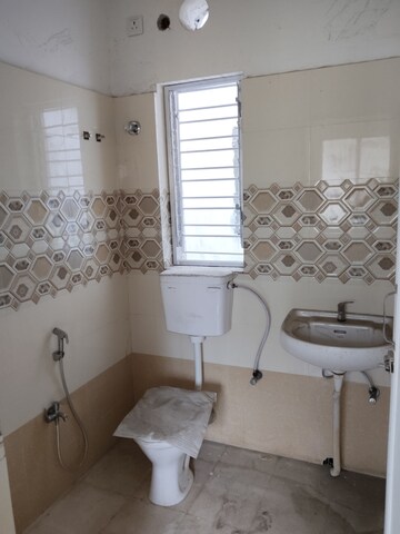 Bathroom in 3 BHK Apartment at Garia – for Sale