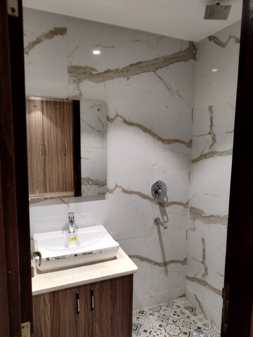 Bathroom in 4 BHK Builder Floor at Freedom Fighters Enclave – for Sale