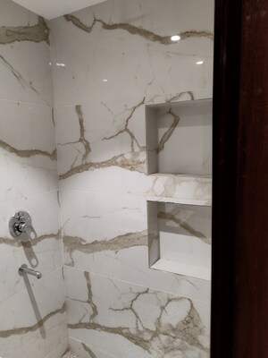 Bathroom in 4 BHK Builder Floor at Freedom Fighters Enclave – for Sale