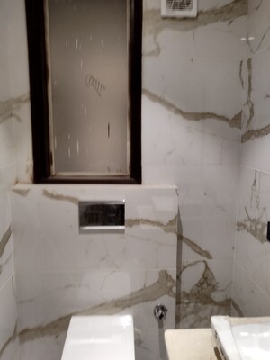 Bathroom in 4 BHK Builder Floor at Freedom Fighters Enclave – for Sale