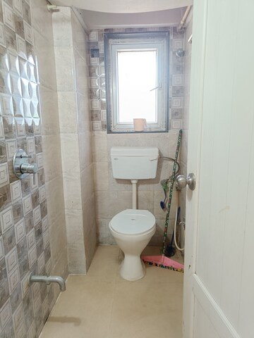 Bathroom in 1 BHK Apartment at Royal Palm Island, Goregaon East – for Sale